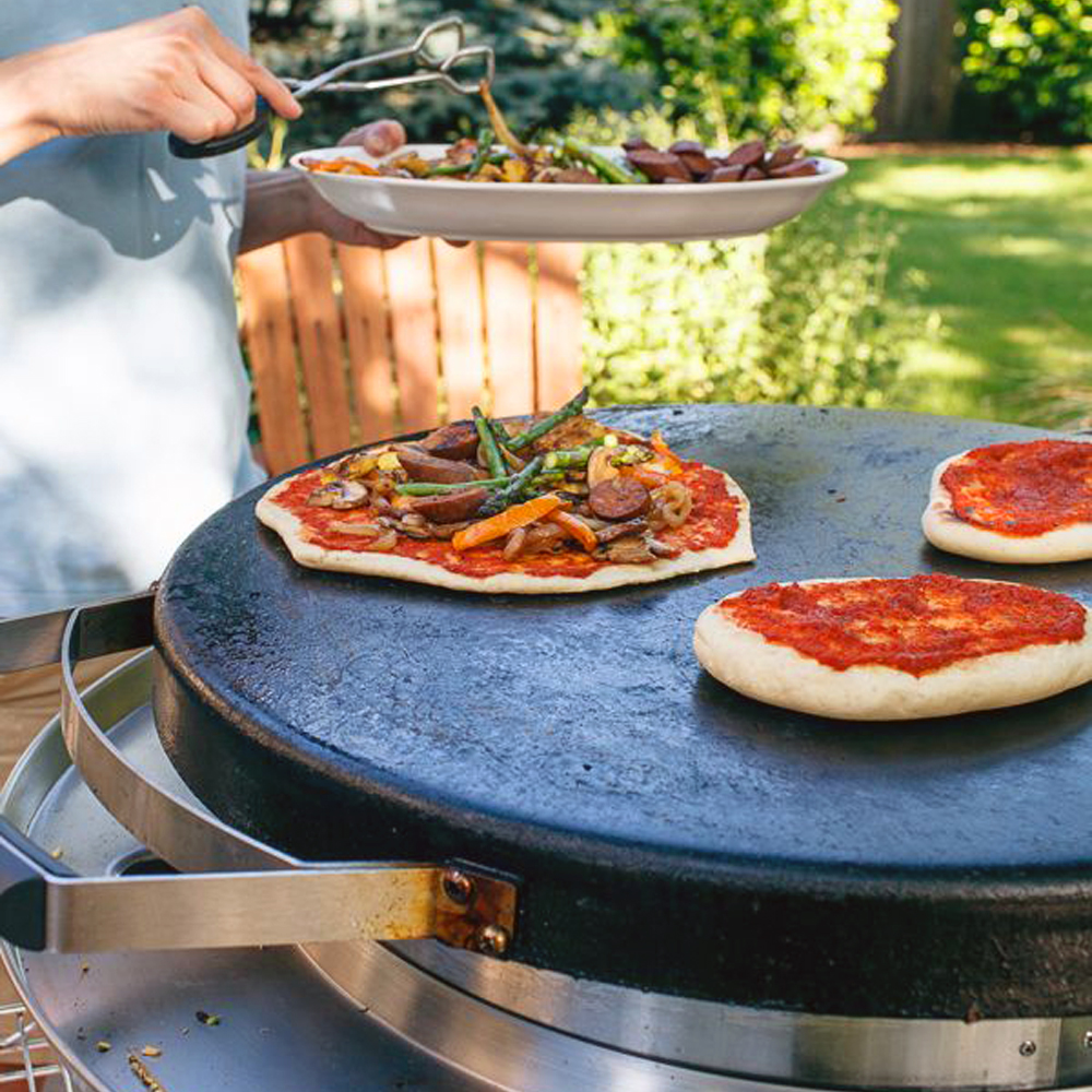 cooking pizza on EVO flattop grill 