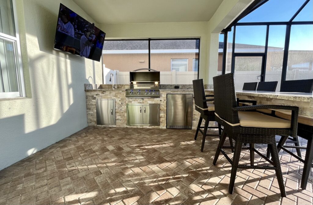 Apollo Beach outdoor kitchen with TV, grill, and more